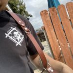 Сombined strap width camera harness with stitching