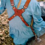 Personalized camera harness with combined strap width
