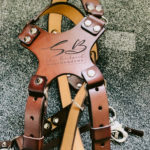Personalized camera harness with combined strap width