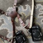 Personalized camera harness with combined strap width